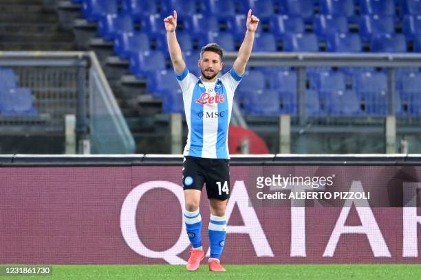 Napoli's Belgian forward Dries Mertens celebrates after scoring his second goal during the Italian Serie A football match AS Roma vs Napoli on March...