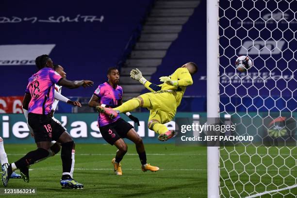 Lyon's Portuguese goalkeeper Anthony Lopes concedes a third goal during the French L1 football match between Lyon and Paris Saint-Germain at the...