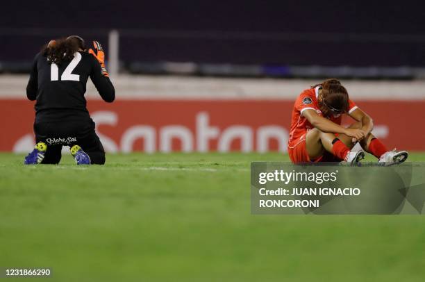 Colombia's America de Cali goalkeeper Luz Tapia and a teammate are seen after losing 2-1 to Brazil's Ferroviaria in the Women's Copa Libertadores...