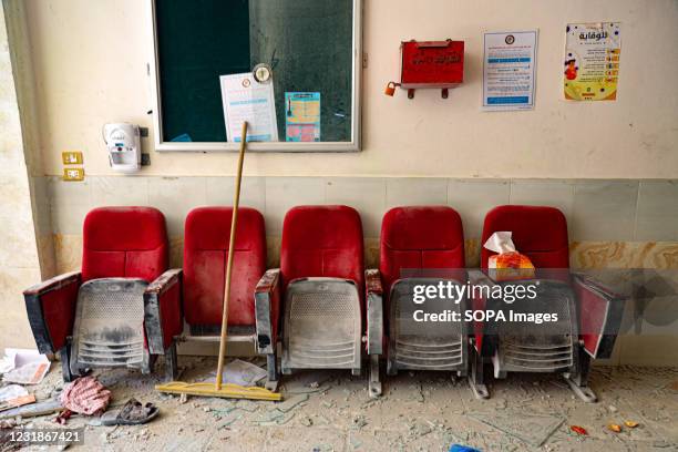 Empty medical chairs and debris at Al-Atareb City Hospital following an artillery attack. 7 civilians including a child and a woman were killed and...