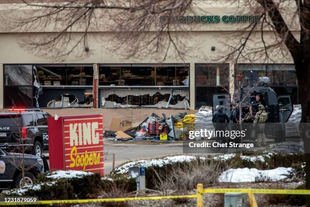 Tactical police units respond to the scene of a King Soopers grocery store after a shooting on March 22, 2021 in Boulder, Colorado. Dozens of police...