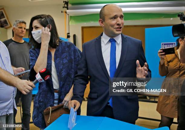 Israel's Naftali Bennett, leader of the right wing 'New Right' party, votes on March 23, 2021 in the city of Raanana in the fourth national election...