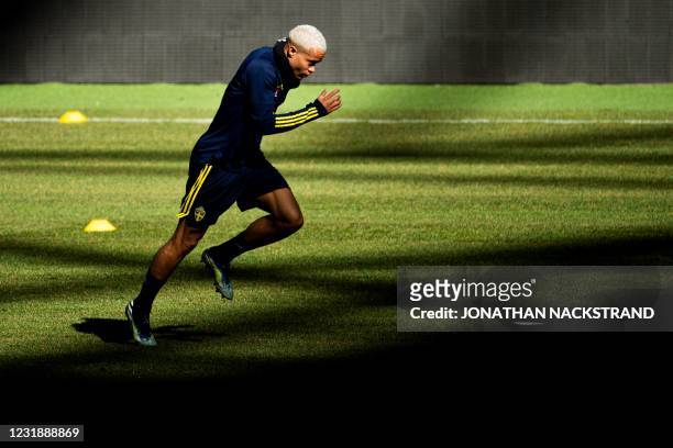 Sweden's forward Robin Quaison attends a training session of Sweden's national football team in Stockholm on March 23 prior to the World Cup...