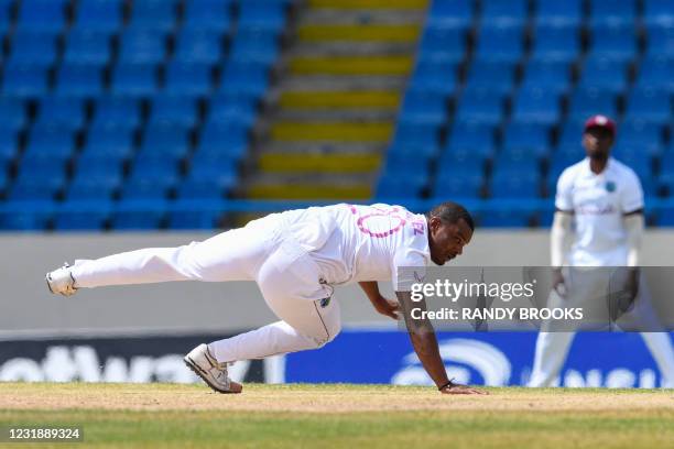 Shannon Gabriel of West Indies attempts to stop the ball during day 3 of the 1st Test between West Indies and Sri Lanka at Vivian Richards Cricket...