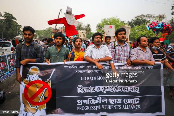 Demonstrators take part in a protest against the upcoming visit of Indian Prime Minister Narendra Modi to Bangladesh to attend the golden jubilee...