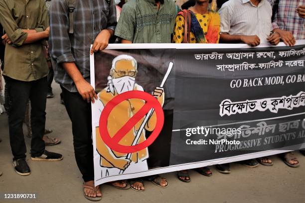 Demonstrators take part in a protest against the upcoming visit of Indian Prime Minister Narendra Modi to Bangladesh to attend the golden jubilee...