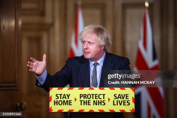 Britain's Prime Minister Boris Johnson gives an update on the coronavirus Covid-19 pandemic during a virtual press conference inside 10 Downing...