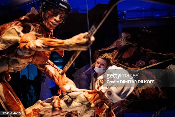 People visit the "Body Worlds", the anatomical exhibition of plastinated human bodies by German anatomist Gunther von Hagens, in Moscow on March 24,...