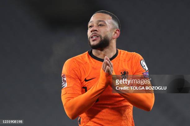 Netherlands' forward Memphis Depay reacts during the FIFA World Cup Qatar 2022 qualification Group G football match between Turkey and The...