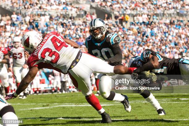 Arizona Cardinals running back Tim Hightower is tacked by Carolina Panthers cornerback Richard Marshall during an NFL football game at Bank of...