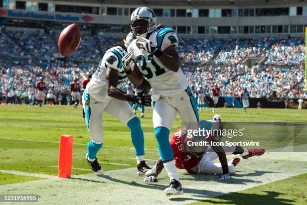 Carolina Panthers cornerback Richard Marshall fights for a pass against Tampa Bay Buccaneers wide receiver Mike Williams during an NFL football game...