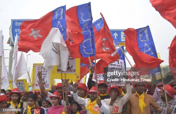 Demonstrators at Ghazipur border, with many sporting yellow turbans, took part in a march around the protest site to mark the anniversary of the...