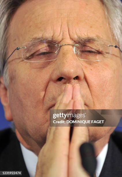 The President of the European Central Bank Jean Claude Trichet gestures during a press conference at the end of the Informal meeting of European...