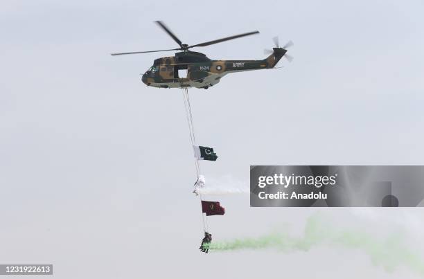 Pakistani army helicopter takes part in a military parade to mark Pakistan's National Day in Islamabad, Pakistan on March 25, 2021. The military...