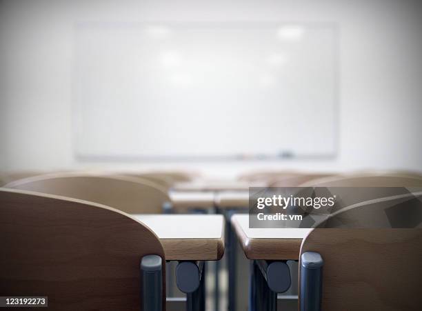 whiteboard in empty classroom - brightly lit classroom stock pictures, royalty-free photos & images