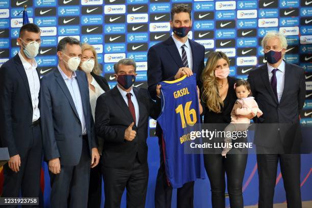 Spanish pivot Pau Gasol's younger brother Adria, parents Agusti Gasol and Marisa Saez, FC Barcelona president Joan Laporta, Pau Gasol, his wife...