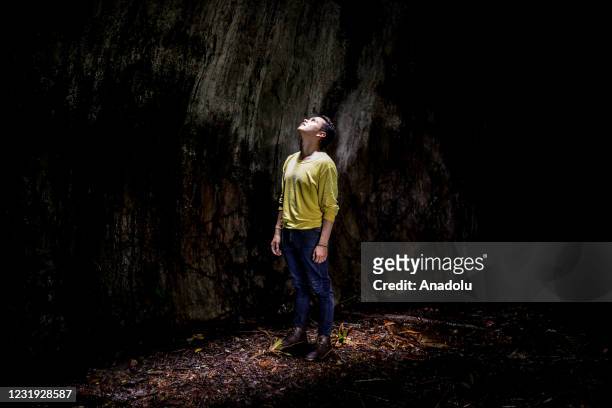 Man views the stone formation called Puerta de Orion , an imposing rocky structure higher than 12 meters and 15 meters in width, in San Jose del...