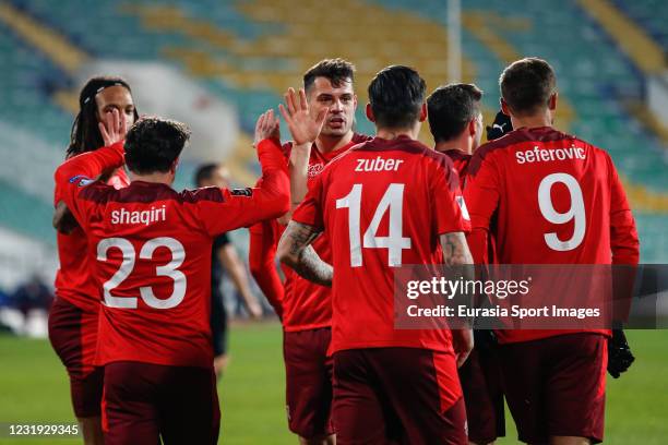 Granit Xhaka of Switzerland celebrates the goal with his teammates during the FIFA World Cup 2022 Qatar qualifying match between Bulgaria and...