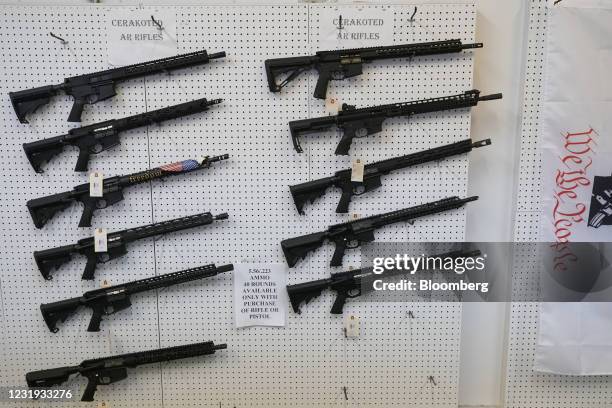 Rifles at a store in Orem, Utah, U.S., on Thursday, March 25, 2021. Two mass shootings in one week are giving Democrats new urgency to pass gun...