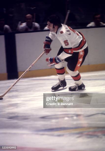 Guy Lapointe of the Montreal Canadiens and Team East skates with the puck during the 26th NHL All-Star Game against Team West on January 30, 1973 at...