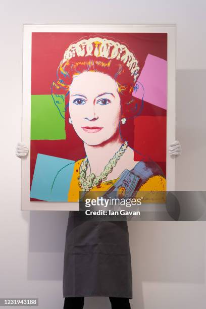 Queen Elizabeth II, from: Reigning Queens by Andy Warhol is displayed during preparations ahead of online sales at Christies Auction House on March...