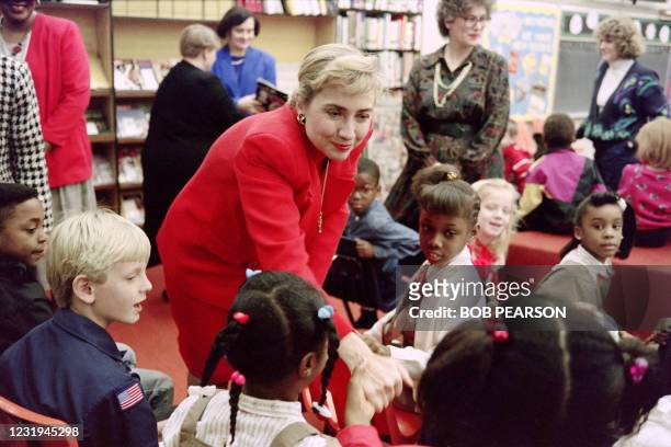 First Lady Hillary Clinton greets children of the elementary school of Rockfeller, on January 5, 1993 in Little Rock.