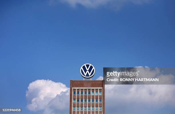 The logo of German carmaker Volkswagen is pictured on the roof of the company's headquarters in Wolfsburg, northern Germany, on March 26, 2021.