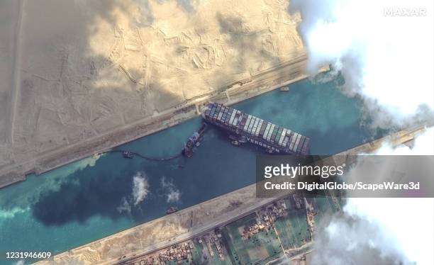 Maxar's WorldView-2 collected new high-resolution satellite imagery of the Suez canal and the container ship that remains stuck in the canal north of...