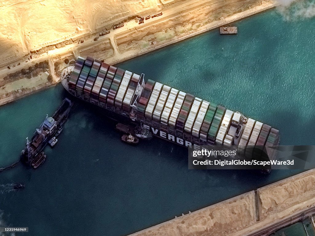 STUCK SHIP EVER GIVEN, SUEZ CANAL -- MARCH 26, 2021:  Maxars WorldView-2 collected new high-resolution satellite imagery of the Suez canal and the container ship (EVER GIVEN) that remains stuck in the canal north of the city of Suez, Egypt.