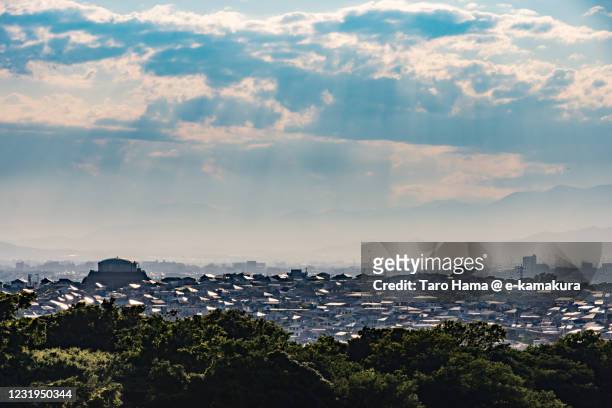 sunset sunbeam on the residential districts in kanagawa prefecture of japan - kanagawa stockfoto's en -beelden