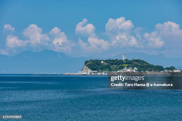 summer clouds on the beach in kanagawa prefecture of japan - kanagawa prefecture stock-fotos und bilder