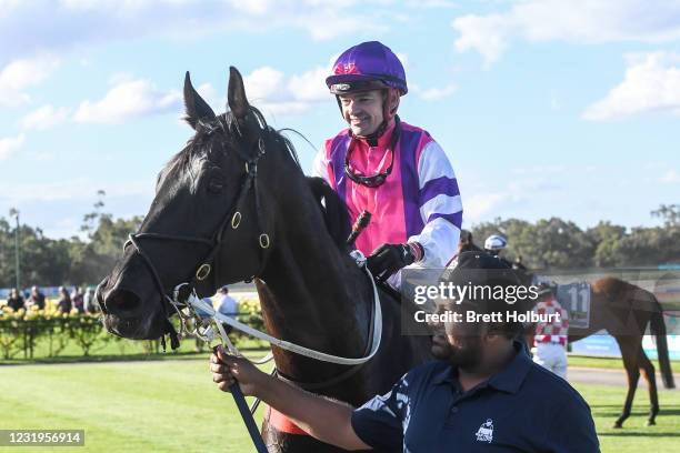 Dean Yendall returns to the mounting yard on Fighting Harada after winning the No Fuss Event Hire BM78 Handicap at Bendigo Racecourse on March 27,...