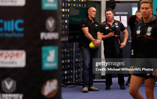 Tony Lockett and senior coach Brett Ratten of the Saints chat during the 2021 AFL Round 02 match between the St Kilda Saints and the Melbourne Demons...