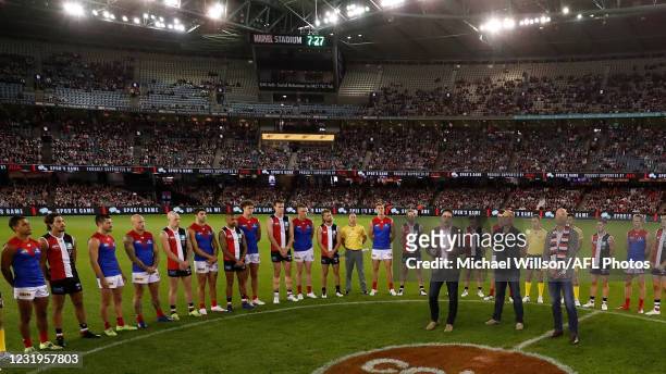 Garry Lyon, Tony Lockett and Stewart Loewe address players and the crowd in honour of Danny Frawley during the 2021 AFL Round 02 match between the St...