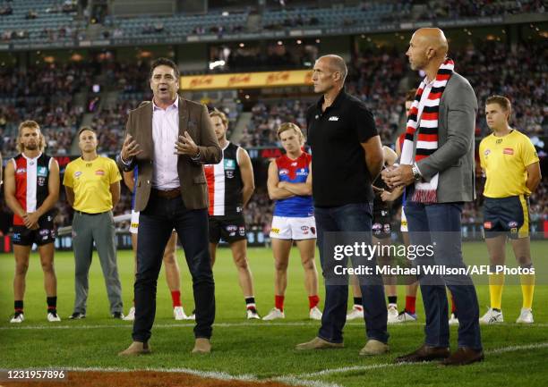 Garry Lyon, Tony Lockett and Stewart Loewe address players and the crowd in honour of Danny Frawley during the 2021 AFL Round 02 match between the St...