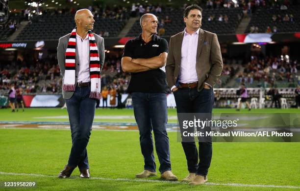 Stewart Loewe, Tony Lockett and Garry Lyon are seen during the 2021 AFL Round 02 match between the St Kilda Saints and the Melbourne Demons at Marvel...