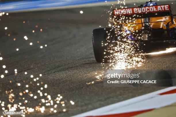 McLaren's Australian driver Daniel Ricciardo drives during the qualifying session on the eve of the Bahrain Formula One Grand Prix at the Bahrain...