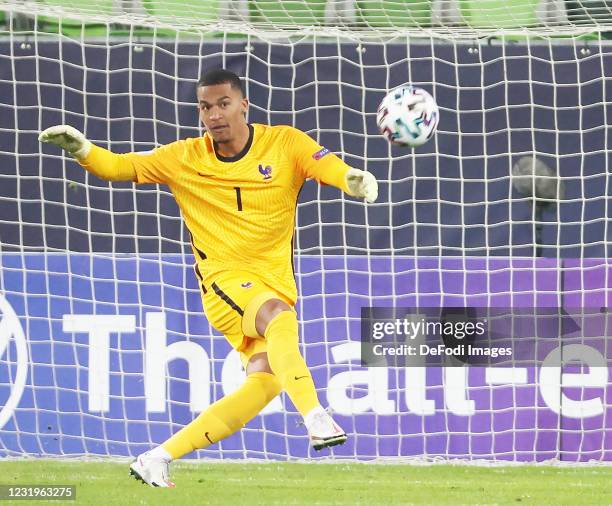 Goalkeeper Alban Lafont of France controls the ball during the 2021 UEFA European Under-21 Championship Group C match between France and Denmark at...