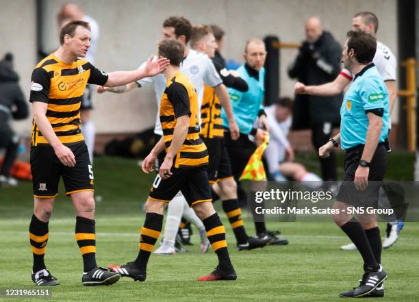 Alloa captain Andy Graham speaks with referee Alan Muir at full time during a Scottish Championship match between Alloa Athletic and Ayr United at...