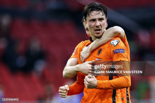 Dutch forward Steven Berghuis celebrates the 1-0 during their World Cup qualifying Group G match between the Netherlands and Latvia at the Johan...