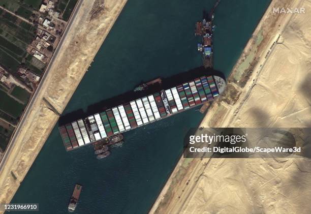 Maxar's WorldView-3 collected new high-resolution satellite imagery of the Suez canal and the container ship that remains stuck in the canal north of...