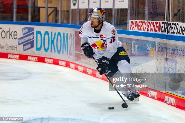 Yannic Seidenberg of EHC Red Bull Muenchen controls the puck during the DEL match between Iserlohn Roosters and EHC Red Bull München on March 23,...