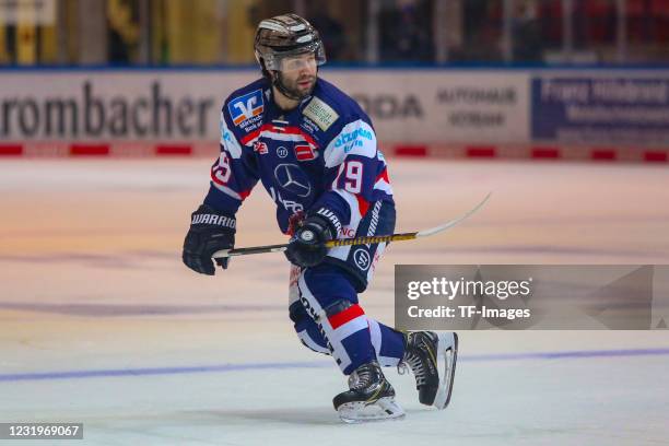 Joseph Whitney of Iserlohn Roosters controls the puck during the DEL match between Iserlohn Roosters and EHC Red Bull München on March 23, 2021 in...
