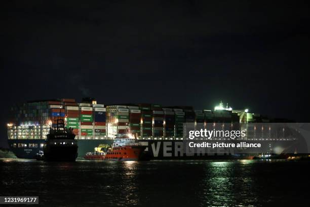 March 2021, Egypt, Suez: A general view of "Ever Given", a container ship operated by the Evergreen Marine Corporation which is currently stuck in...