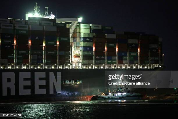 March 2021, Egypt, Suez: A general view of "Ever Given", a container ship operated by the Evergreen Marine Corporation which is currently stuck in...