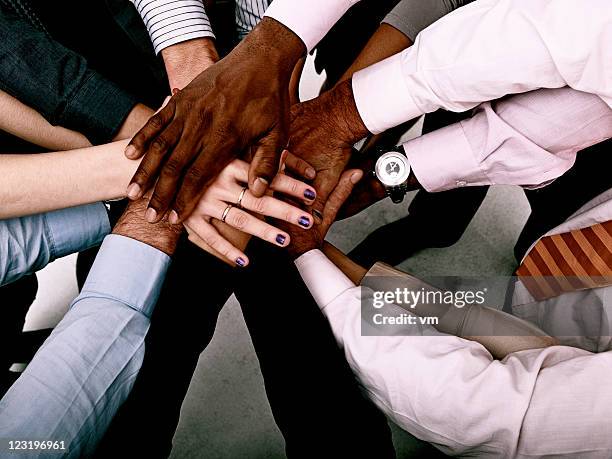 hands together - mid section stock pictures, royalty-free photos & images