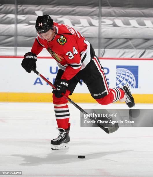 Carl Soderberg of the Chicago Blackhawks takes a during warm-up prior to a game against the Nashville Predators at the United Center on March 27,...