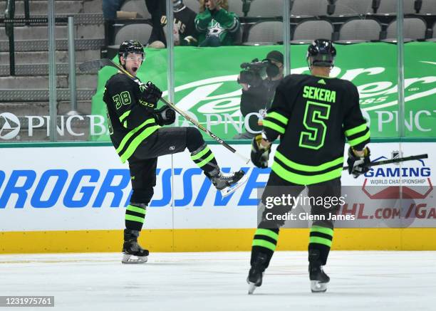 Joel L'Esperance and Andrej Sekera of the Dallas Stars celebrate a goal against the Florida Panthers at the American Airlines Center on March 27,...