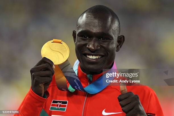 Gold medalist David Lekuta Rudisha of Kenya celebrates on the podium with his medal for the men's 800 metres during day six of 13th IAAF World...