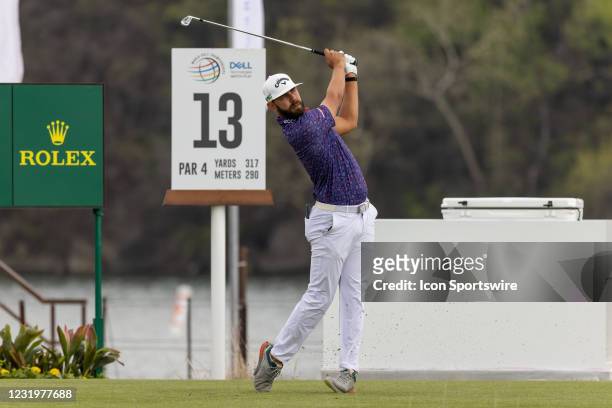 Erik van Rooyen choses an iron for his tee shot on the short par 4 thirteenth hole during the Round of 16 of the WGC-Dell Technologies Match Play...